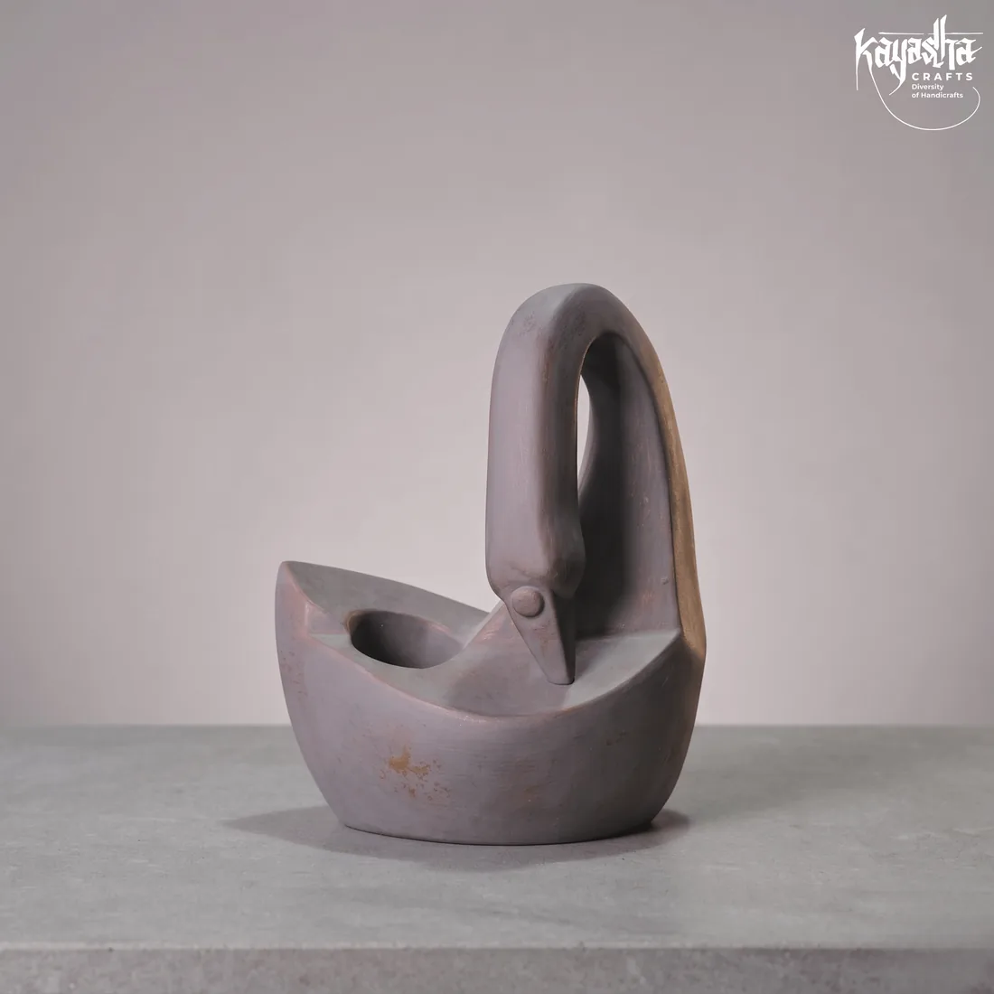 Terracotta swan statue