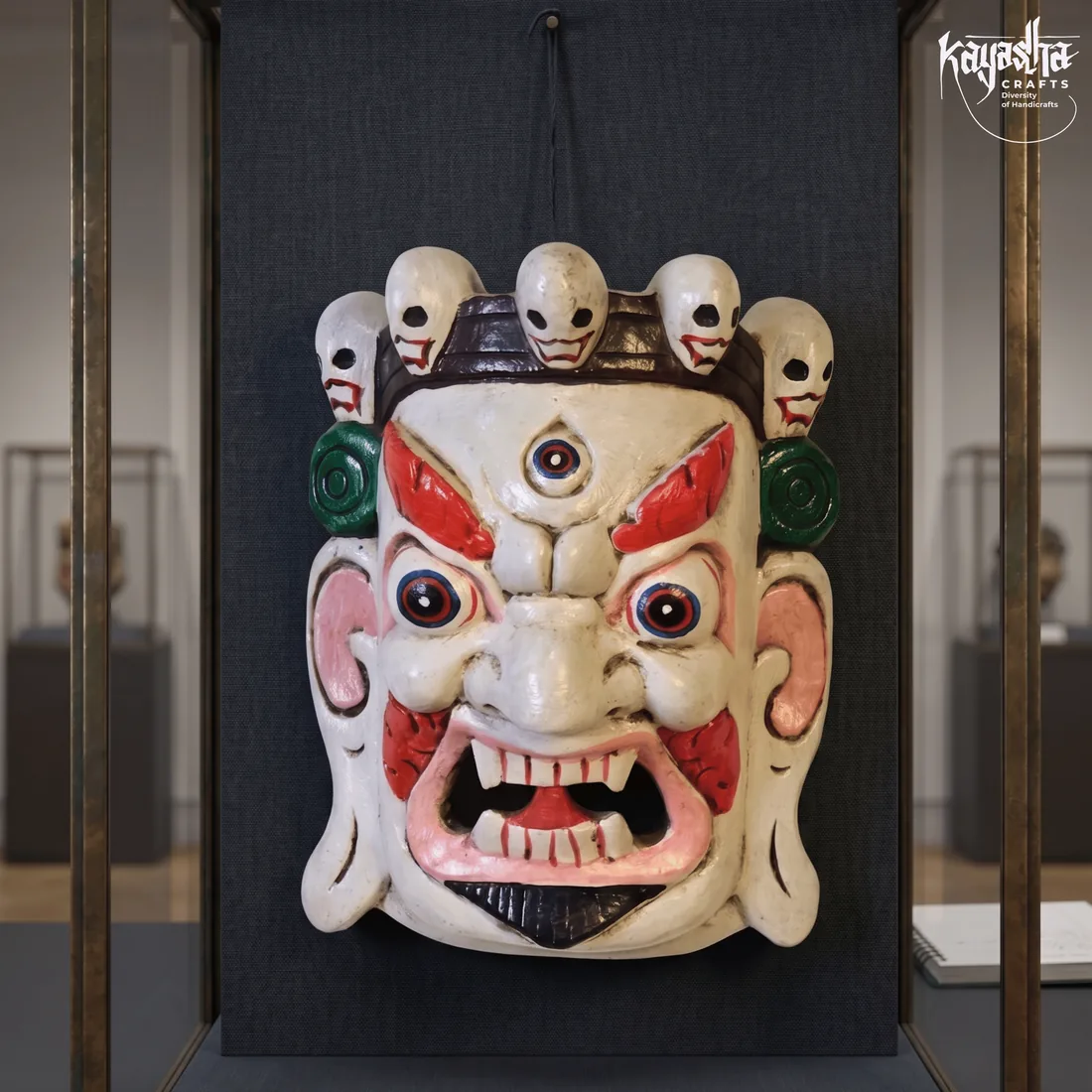 Medium carved wooden mask